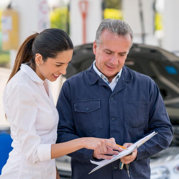 mechanic explaining things to client